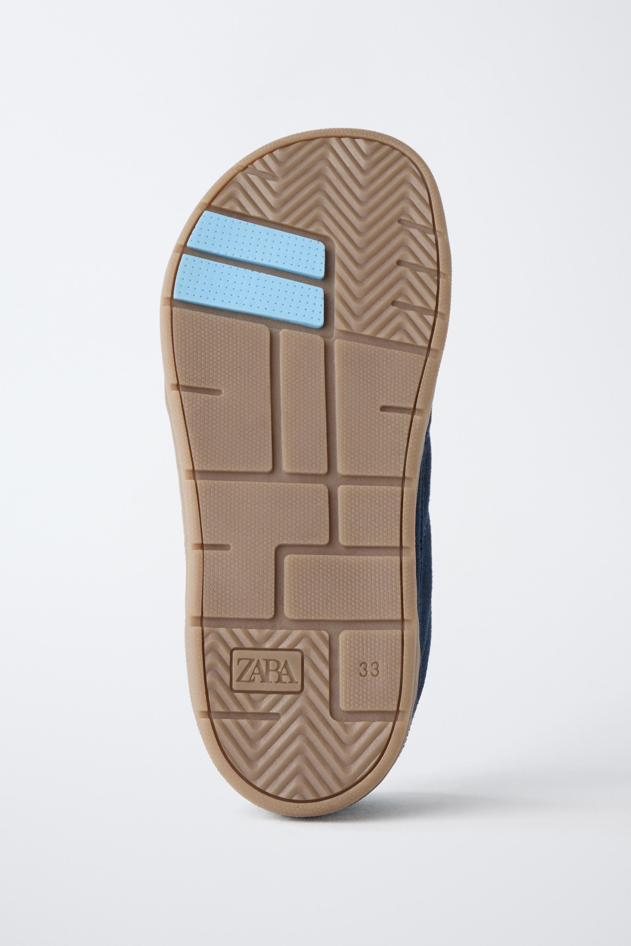 TENNIS EN CUIR PIEDS NUS
